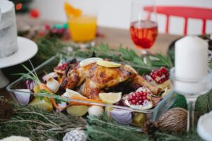 roasted chicken on glass form with vegetables