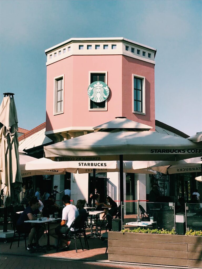 people dining al fresco in a starbucks cafe