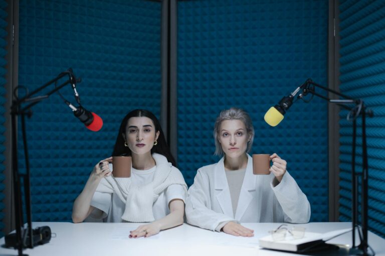 women holding their mugs